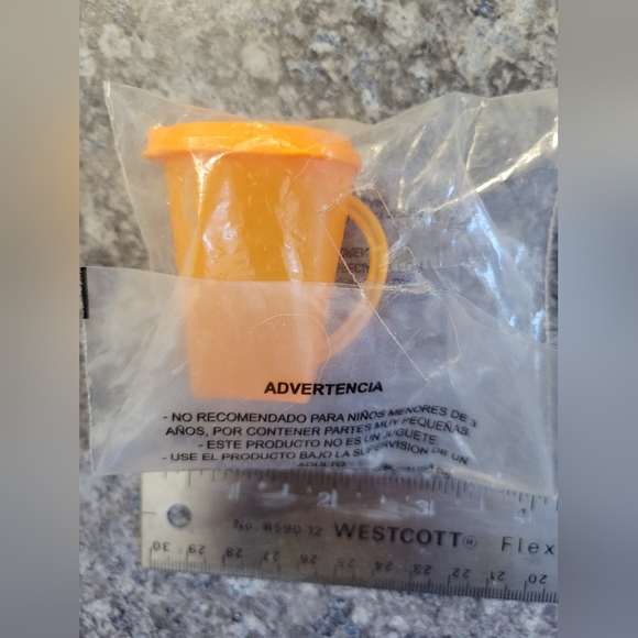 Tupperware Other - New-in-package Vinatge Tupperware Magnet!
